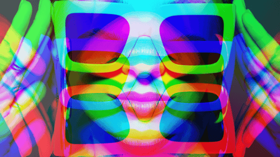 rainbow colored image of glasses on a woman's face
