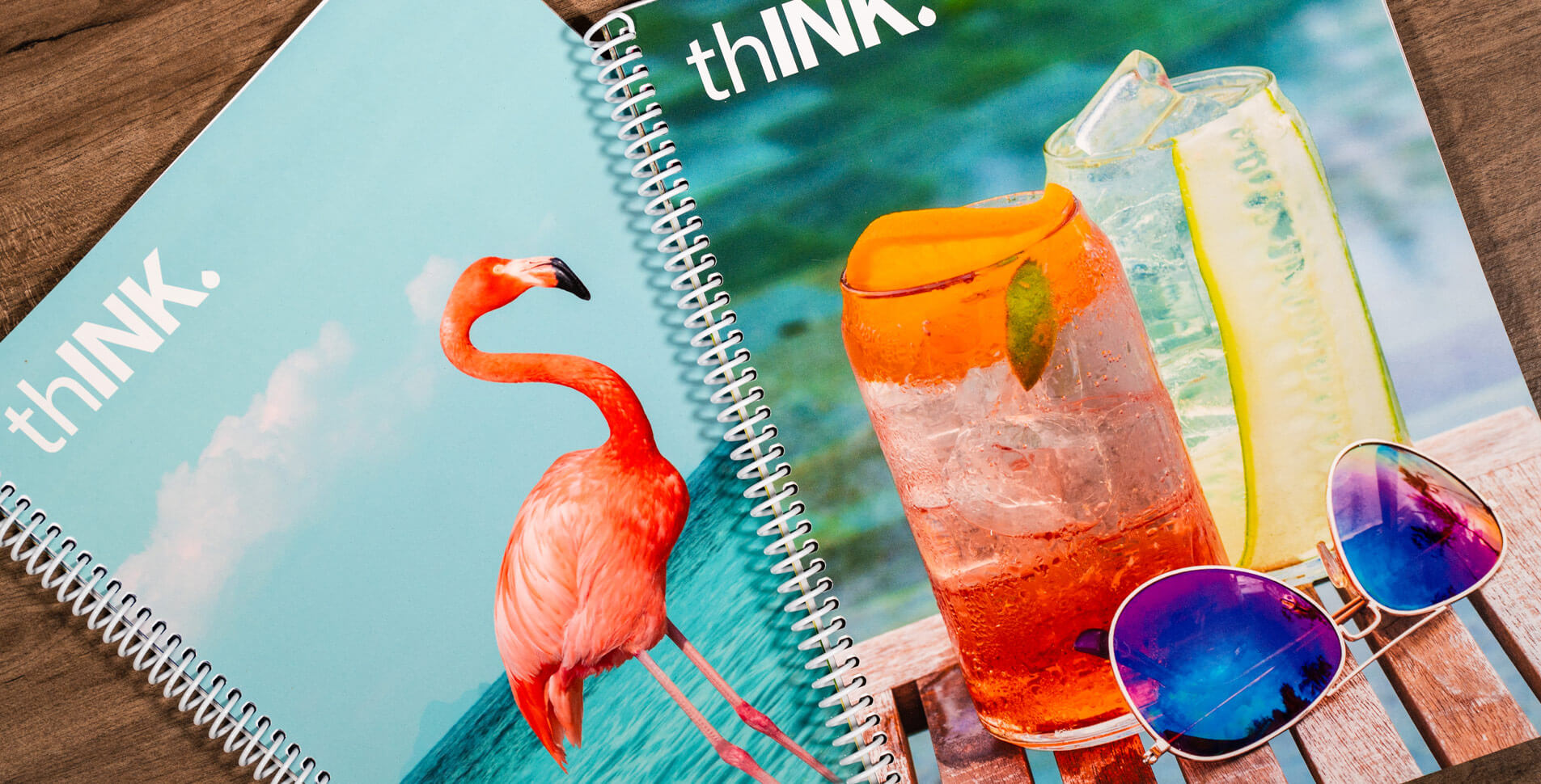 thINK branded event planner booklet with a image of a flamingo and a drink with sunglasses
