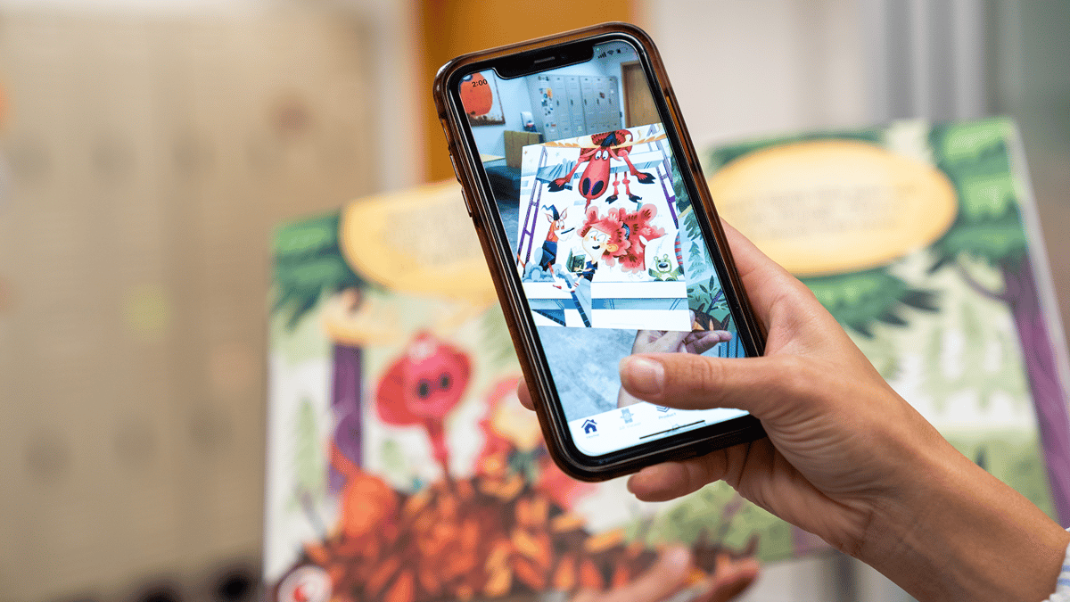 Phone scanning an augmented reality children's book