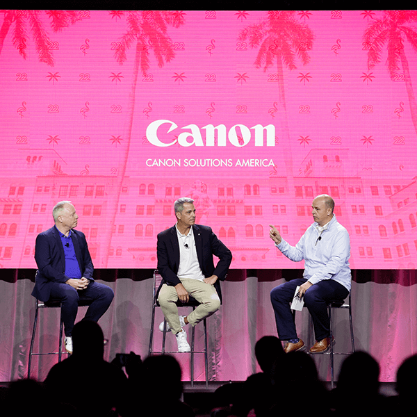 Three men talking at a thINK conference session